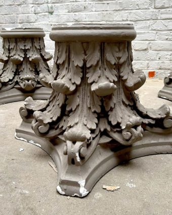 Old grey column feet with zoom bases