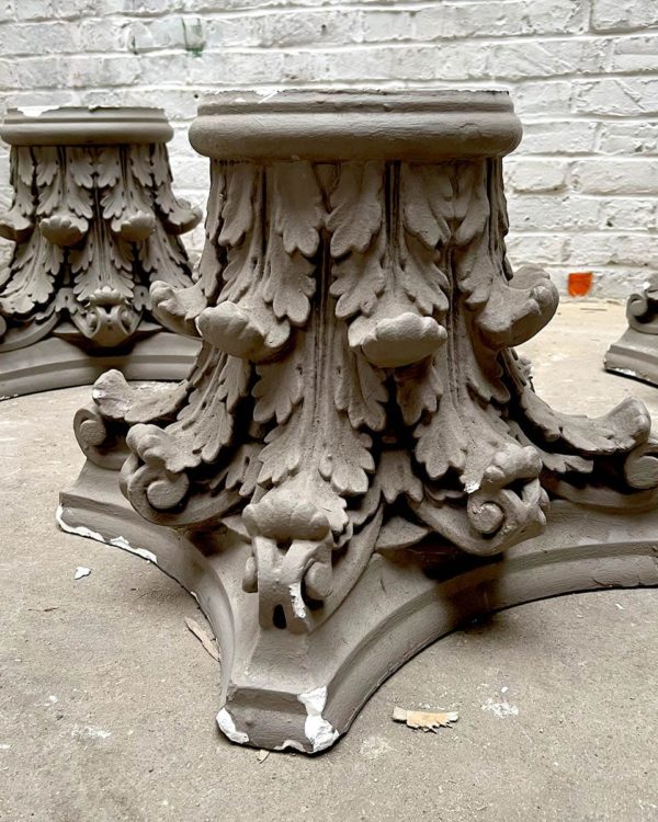 Old grey column feet with zoom bases