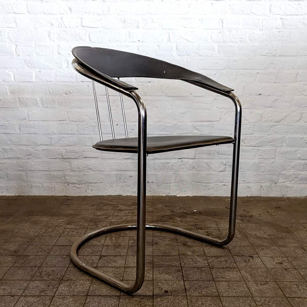 Fauteuil cuir noir et chrome