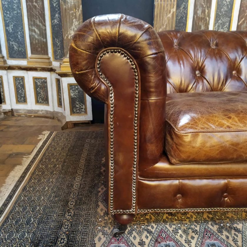 Brown leather Chesterfield sofa