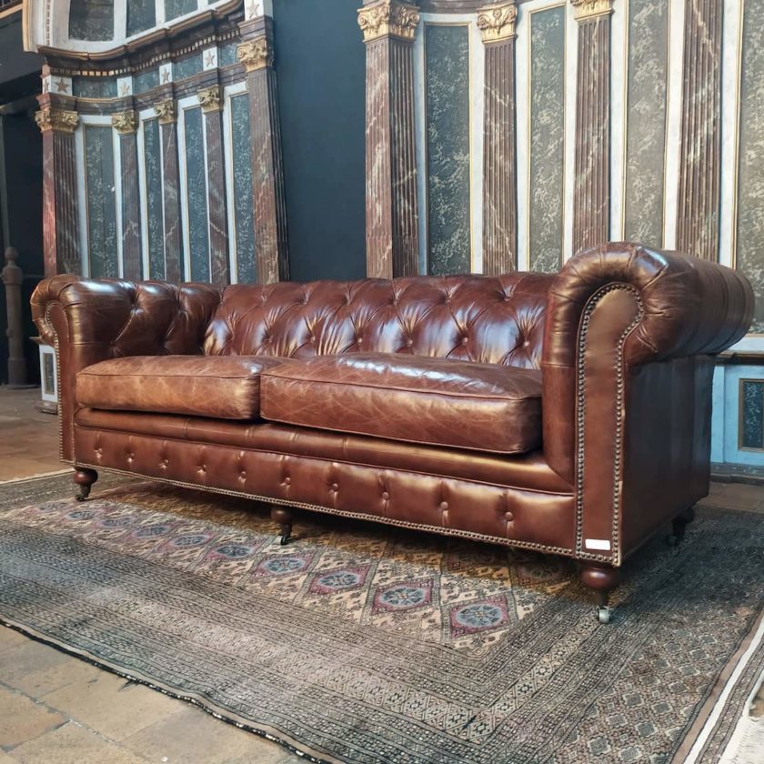 Brown leather Chesterfield sofa