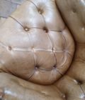 Fauteuil chesterfield chippendale assise