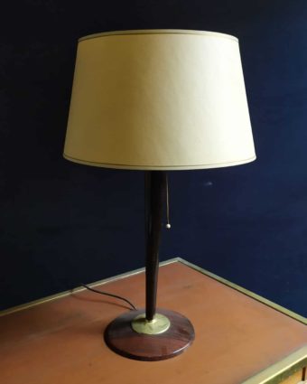 Vintage lamp with wooden base and glass bowl.