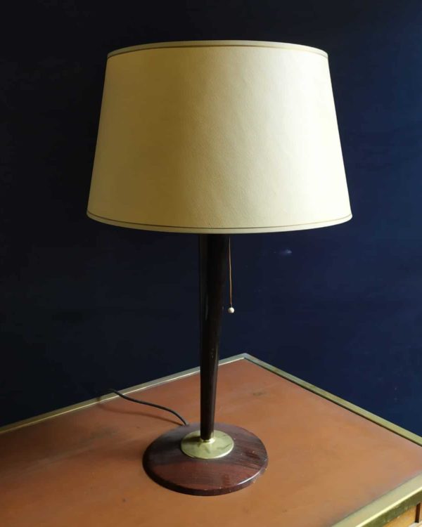 Vintage lamp with wooden base and glass bowl.