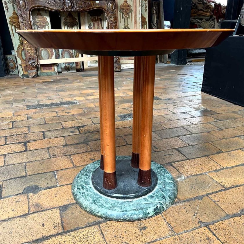 Pedestal table with chessboard feet