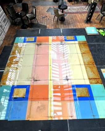 painted canvas ceiling mounted on glass
