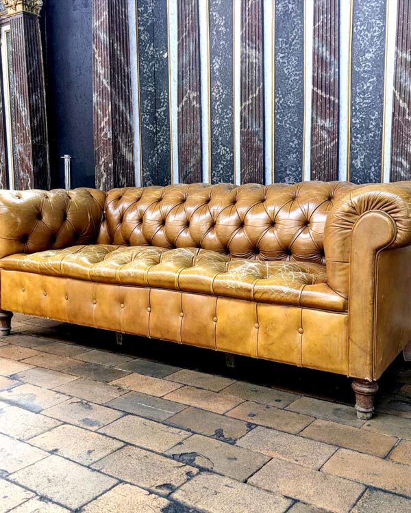 Beige leather chesterfield sofa