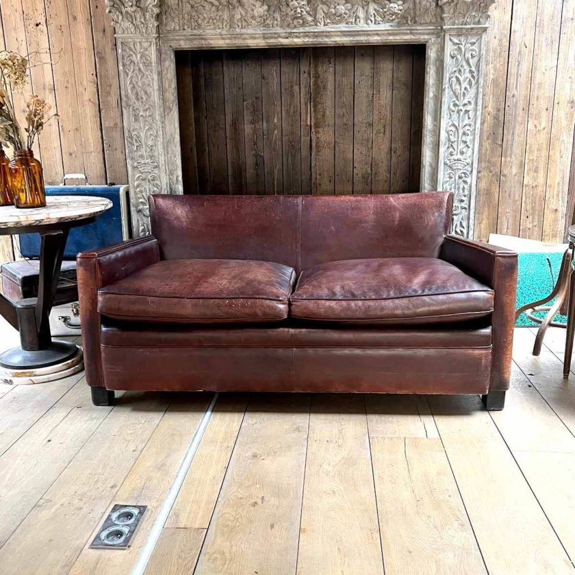 Two seater leather sofa face