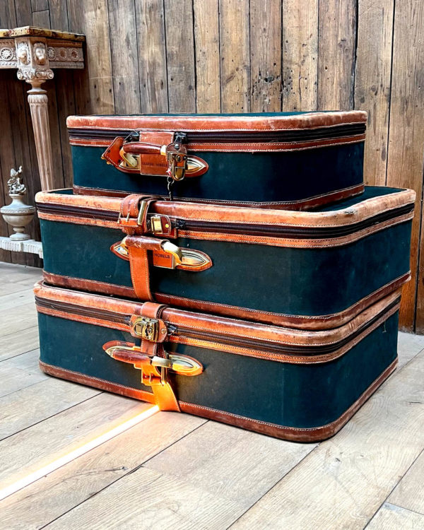 Suite of three suitcases