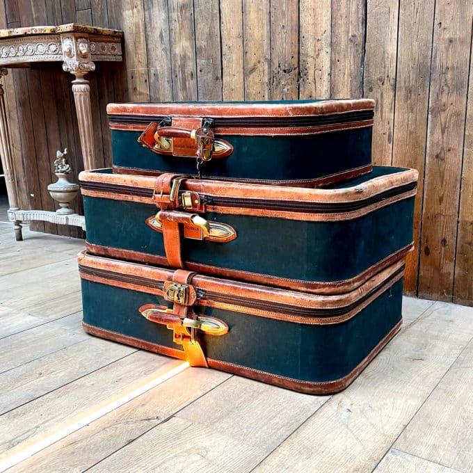 Suite of three suitcases