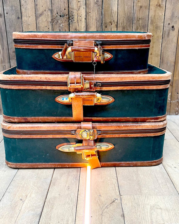 Suite of three suitcases front