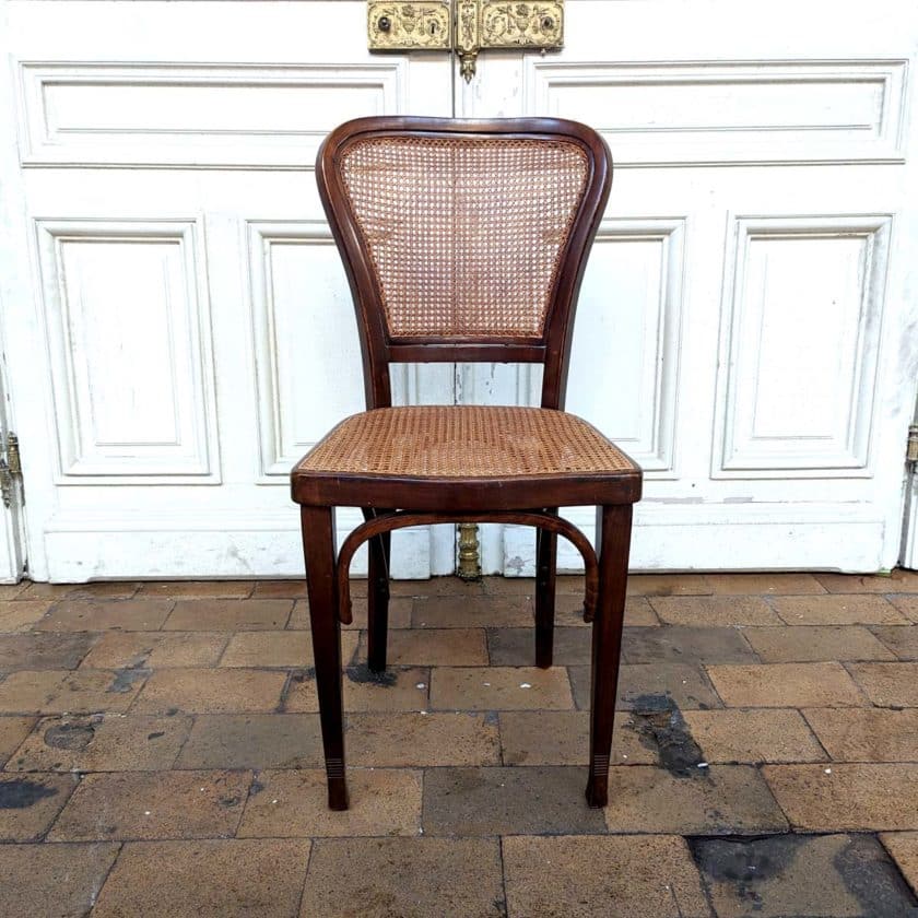 Set of 4 cane chairs front