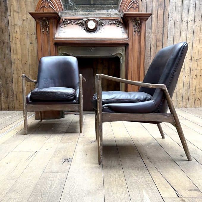 Pair of Scandinavian-style leather armchairs side