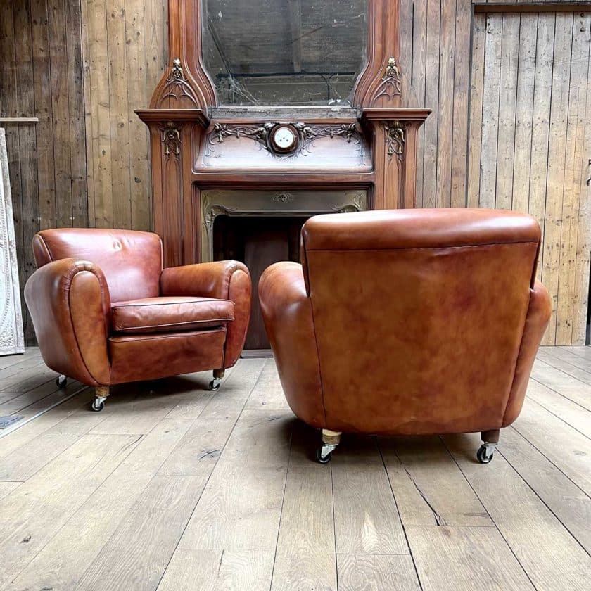 pair of club back armchairs