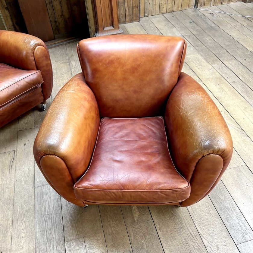 pair of club top armchairs