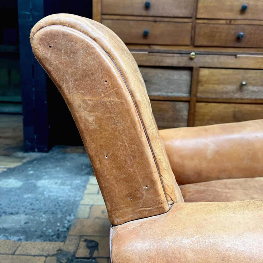Pair of leather club chairs zoom side