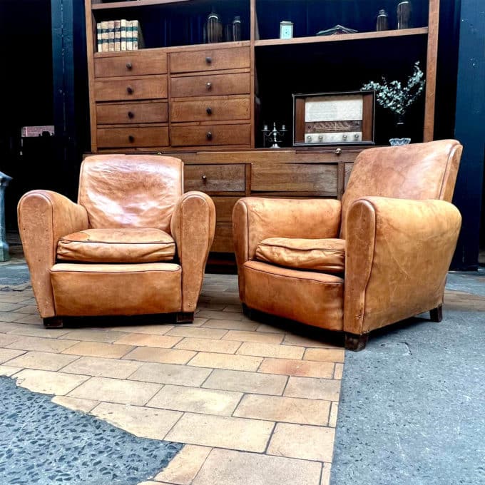 Pair of leather club chairs front