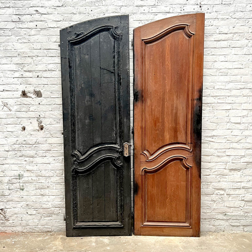 Double louis xv oak door, one side burned wood.