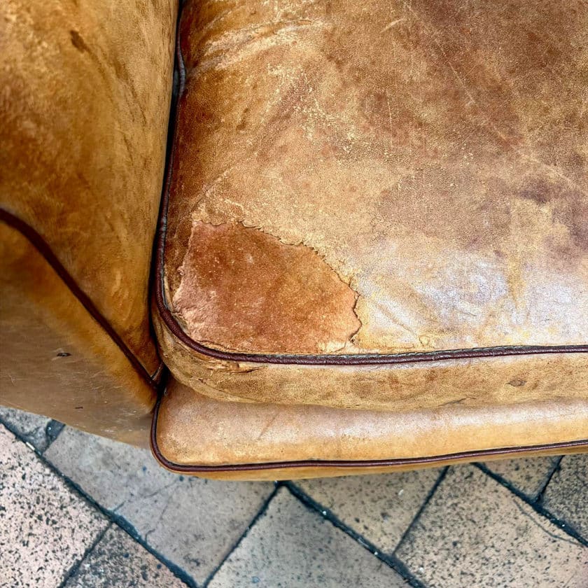 Pair of leather club chairs details