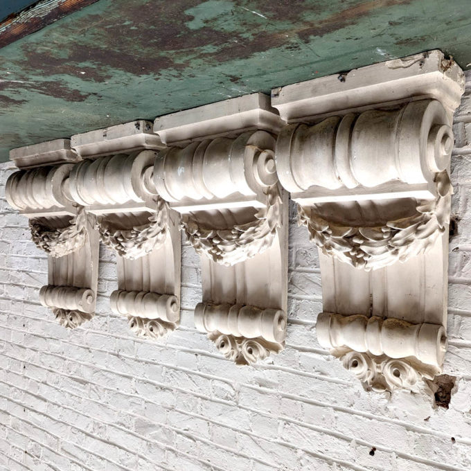 Set of four wall ornaments in plaster front