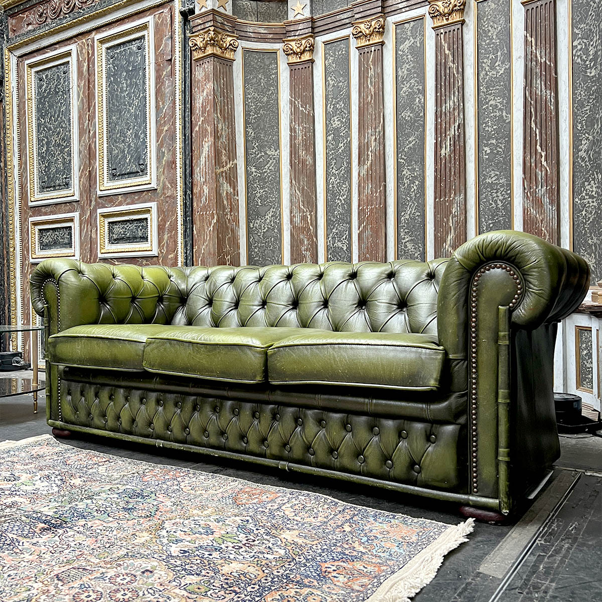 Green leather chesterfield sofa