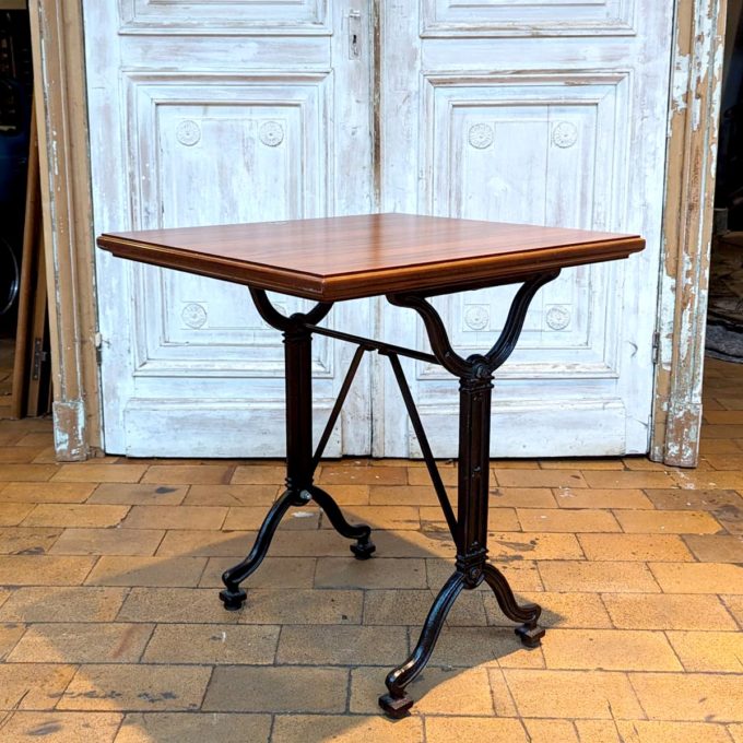 Bistro table with imitation rosewood top