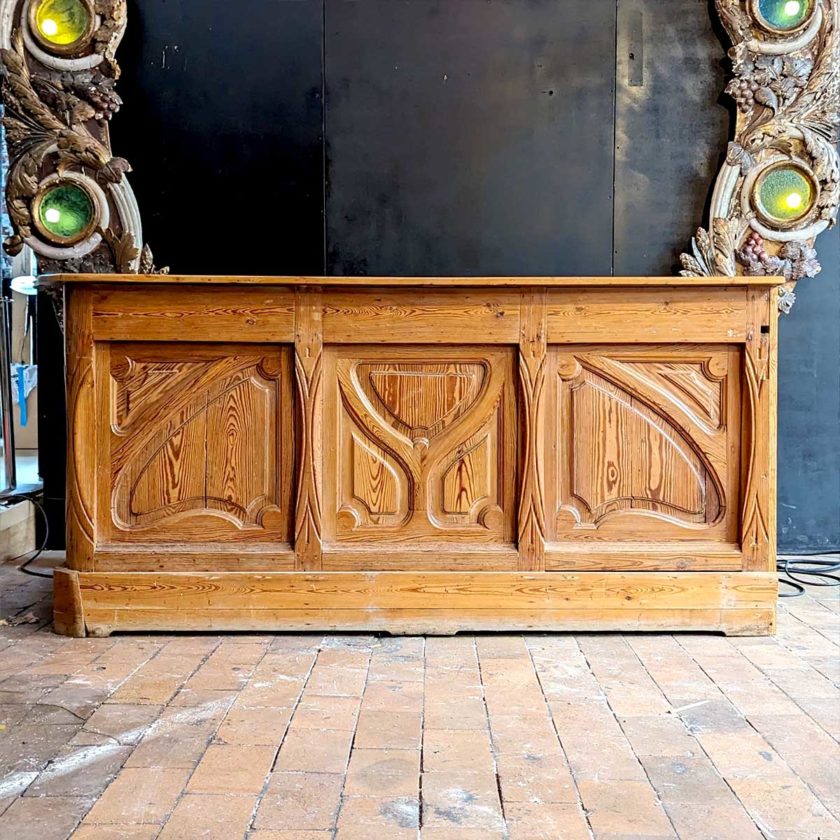 Art Nouveau-style pine countertop front