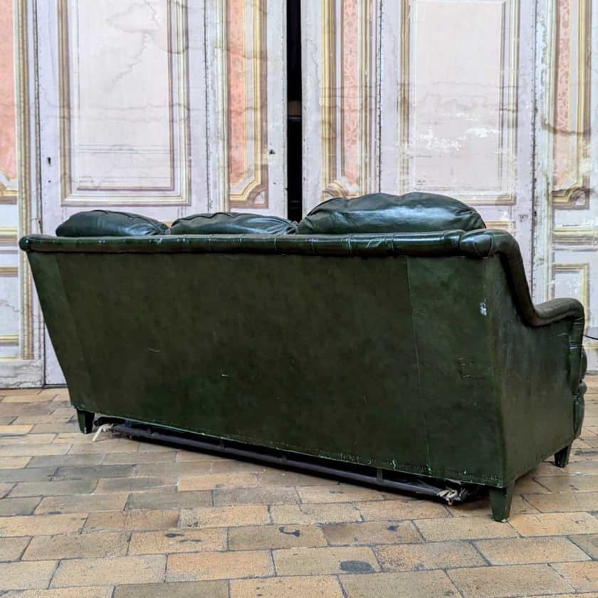 Sofa bed in green leather back