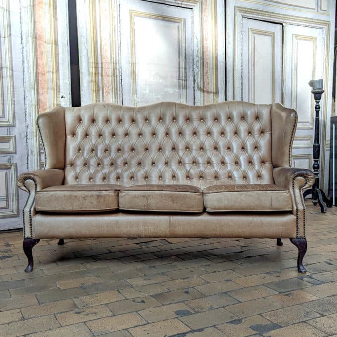 chesterfield with beige leather ears front