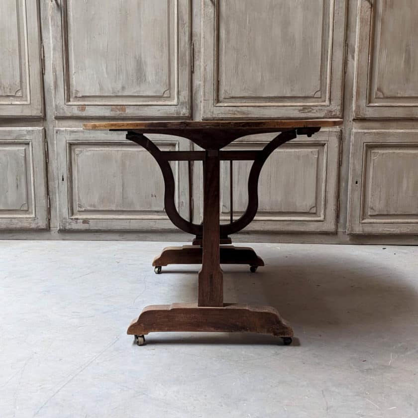 oval table in burr walnut side