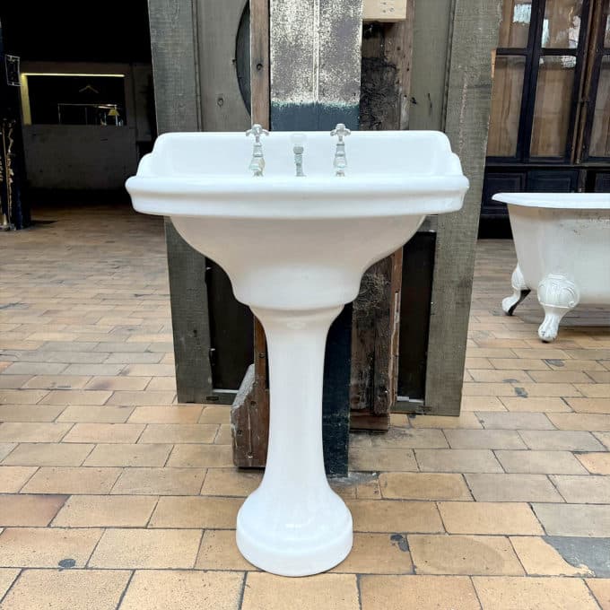 Old pedestal washbasin