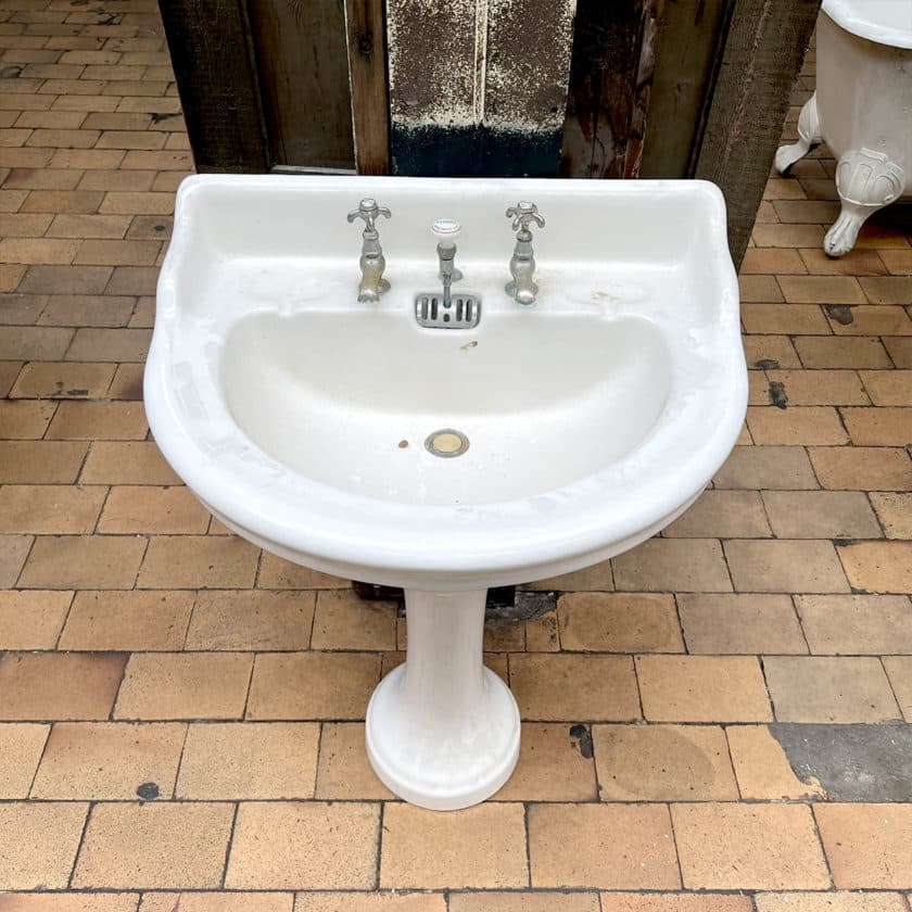 Old pedestal washbasin