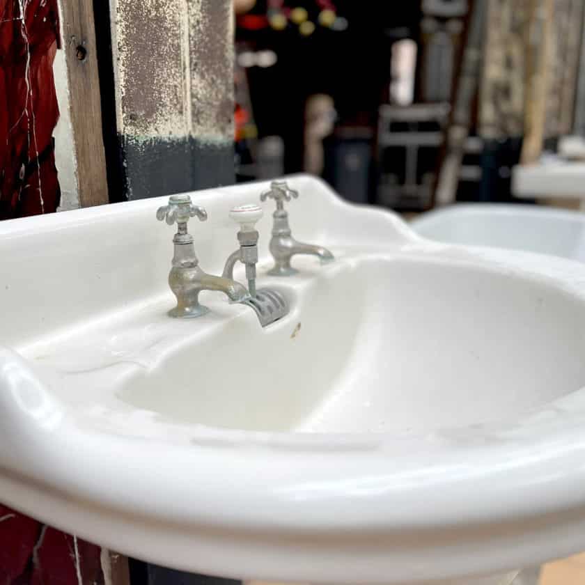 Old pedestal washbasin