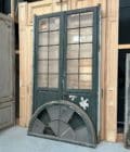 Antique double door with transom