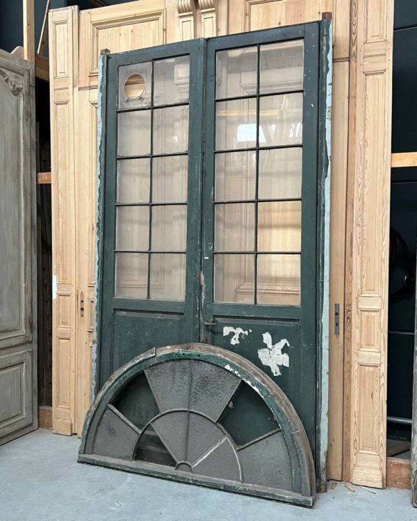 Antique double door with transom