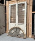 Antique double door with transom