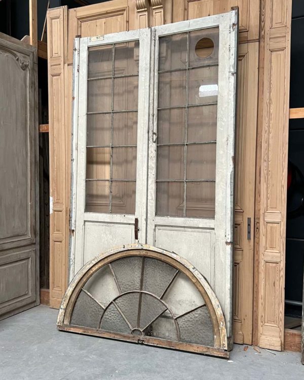 Antique double door with transom