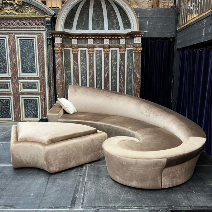 Large rounded Kagan-style sofa