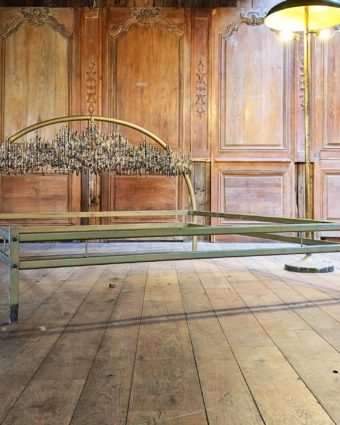 Bed with bronze headboard