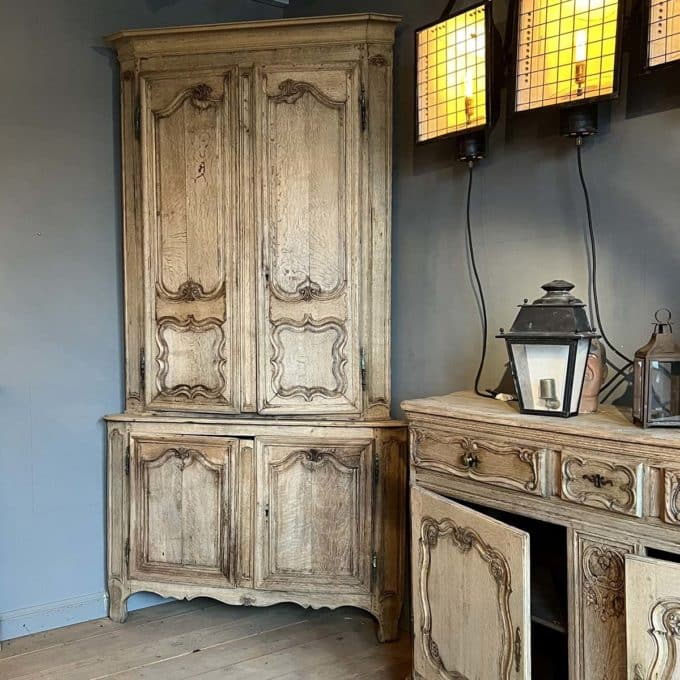 Louis XV-style oak stripped corner cabinet