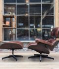Armchair and ottoman in the style of Charles Eames side