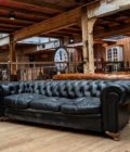 Canapé Chesterfield ancien en cuir noir