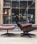 Armchair and ottoman in the style of Charles Eames side 1