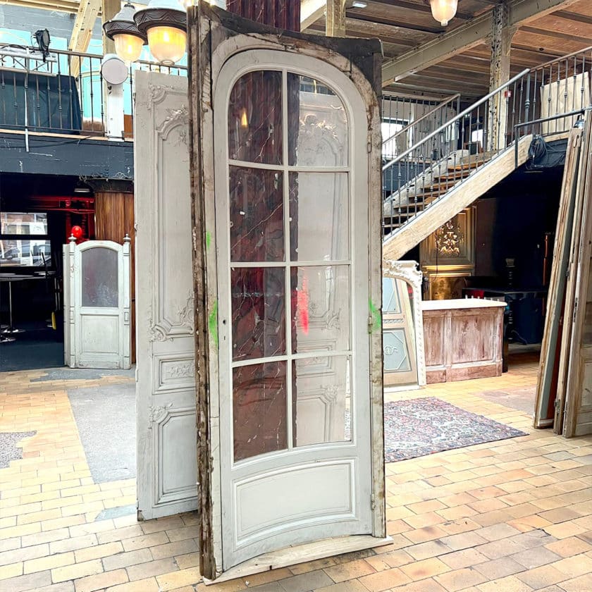 Pair of curved doors with oak frames