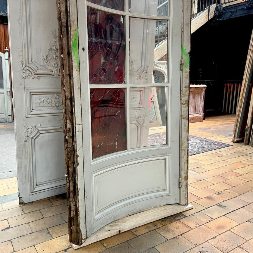 Pair of curved doors with oak frames