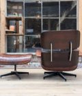 Armchair and ottoman in the style of Charles Eames back