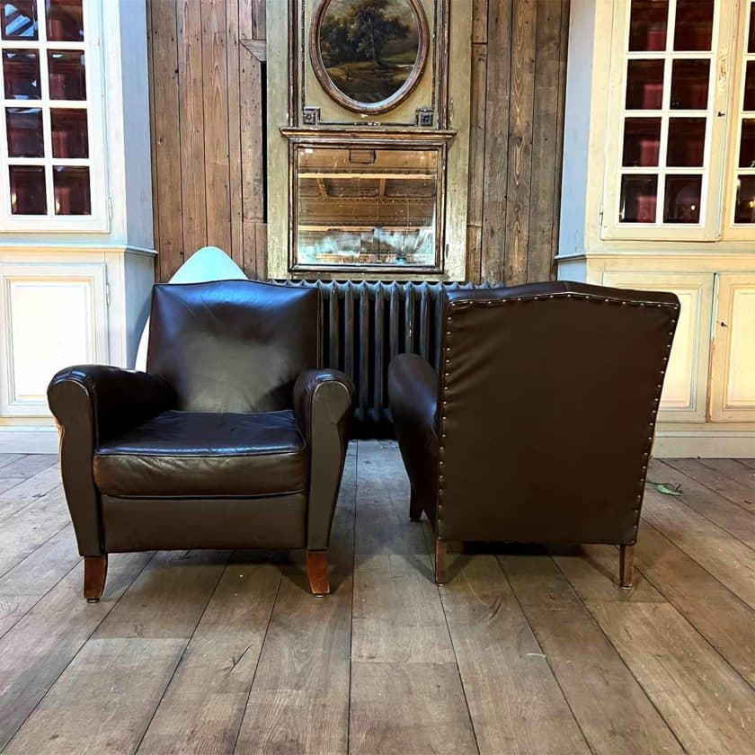 Pair of club back armchairs