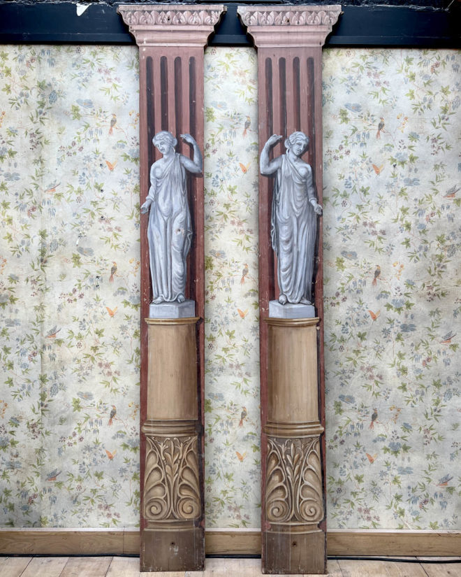 Pairs of wooden stage columns painted in faux marble and after the Antique style.
