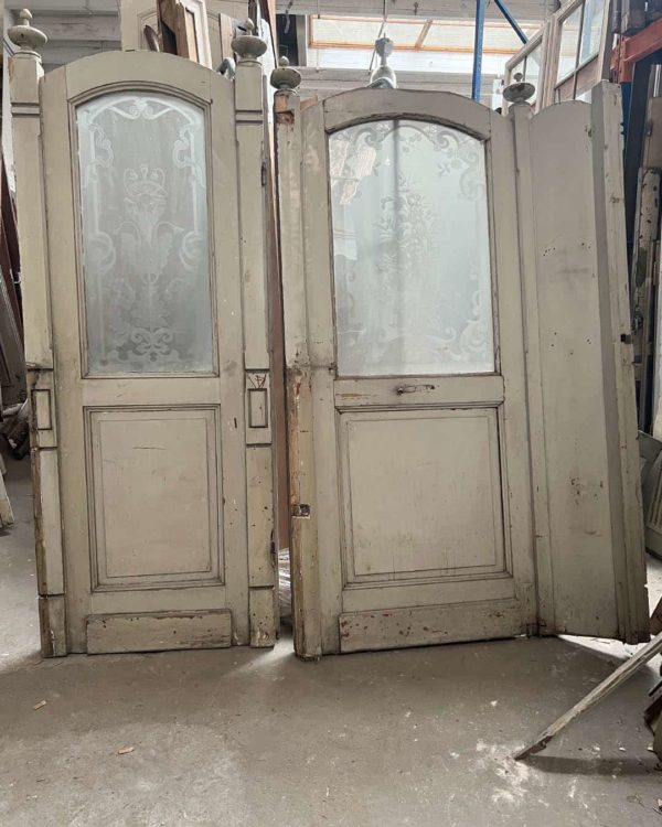 Pair of engraved glass restaurant partitions