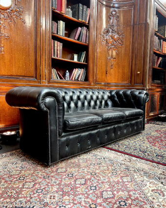 Large black leather chesterfield sofa